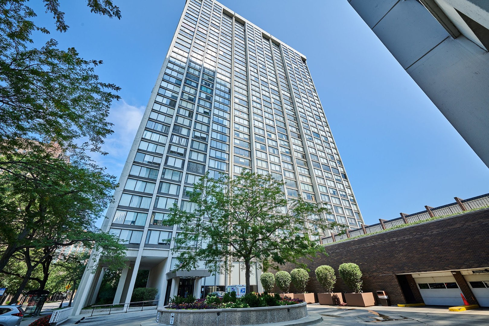 5455 North Sheridan Road, Unit 3811 Chicago, IL 60640 - Photo 1 of 35 front view of a building