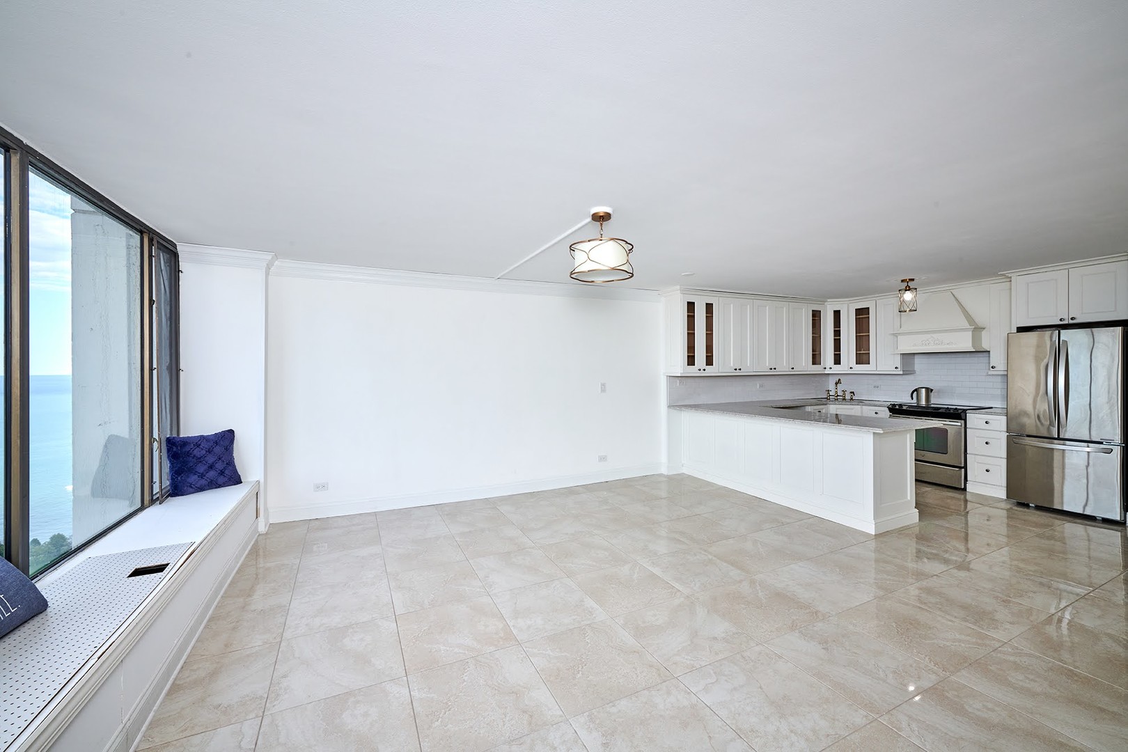 5455 North Sheridan Road, Unit 3811 Chicago, IL 60640 - Photo 16 of 35 a view of kitchen with cabinets and refrigerator