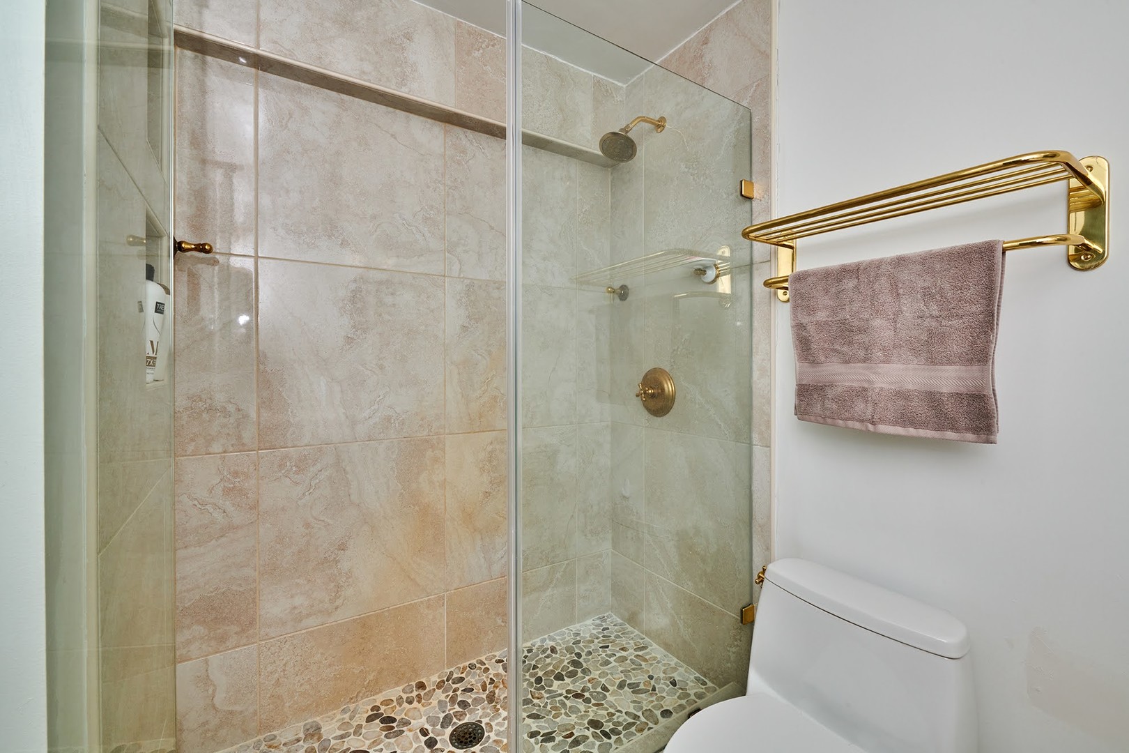 5455 North Sheridan Road, Unit 3811 Chicago, IL 60640 - Photo 22 of 35 a bathroom with a shower and a toilet