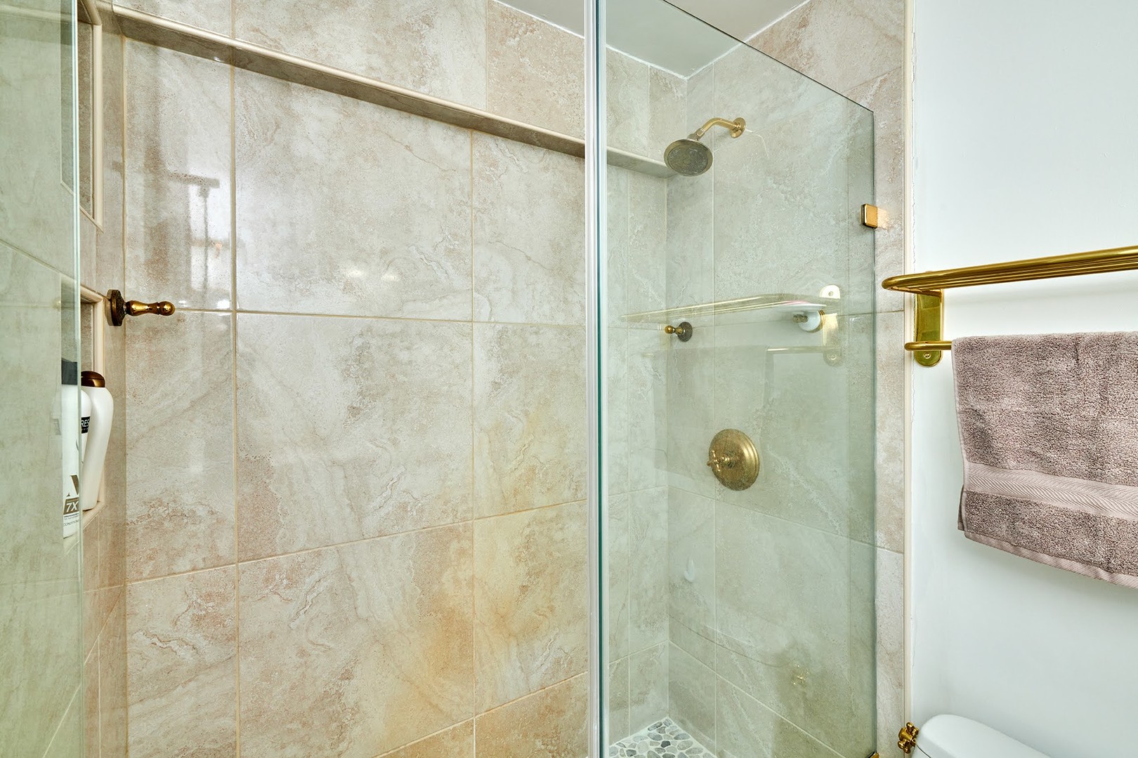 5455 North Sheridan Road, Unit 3811 Chicago, IL 60640 - Photo 24 of 35 a bathroom with a glass shower door