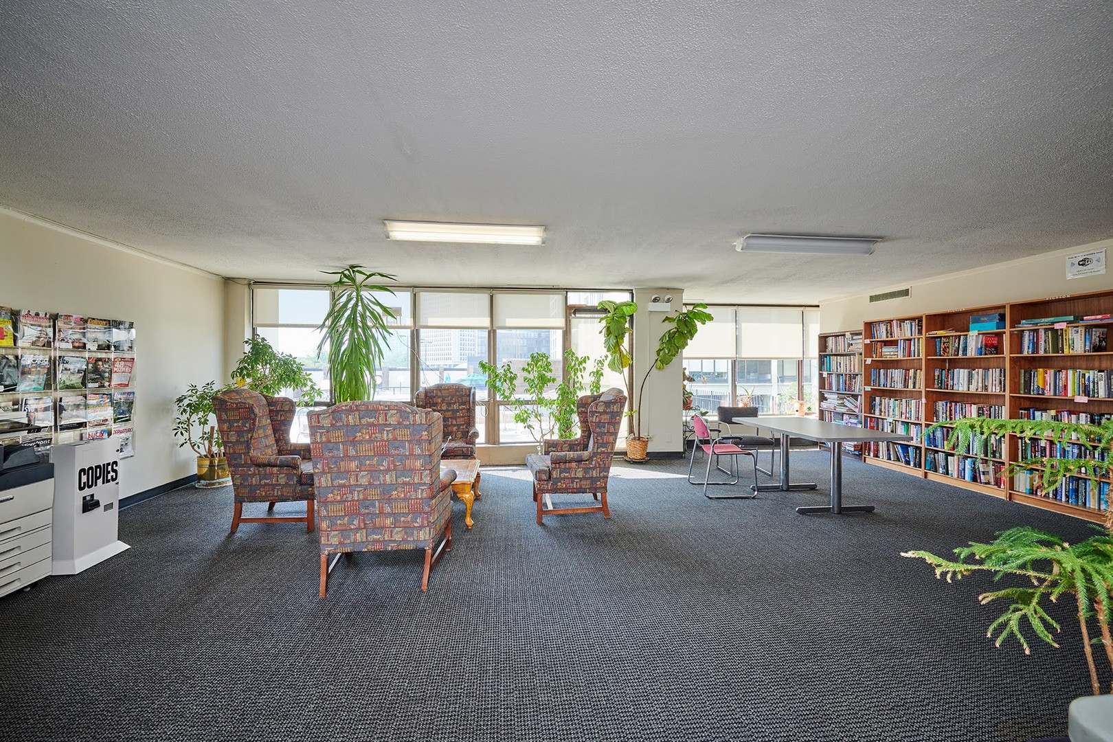 5455 North Sheridan Road, Unit 3811 Chicago, IL 60640 - Photo 30 of 35 a living room with furniture and a window