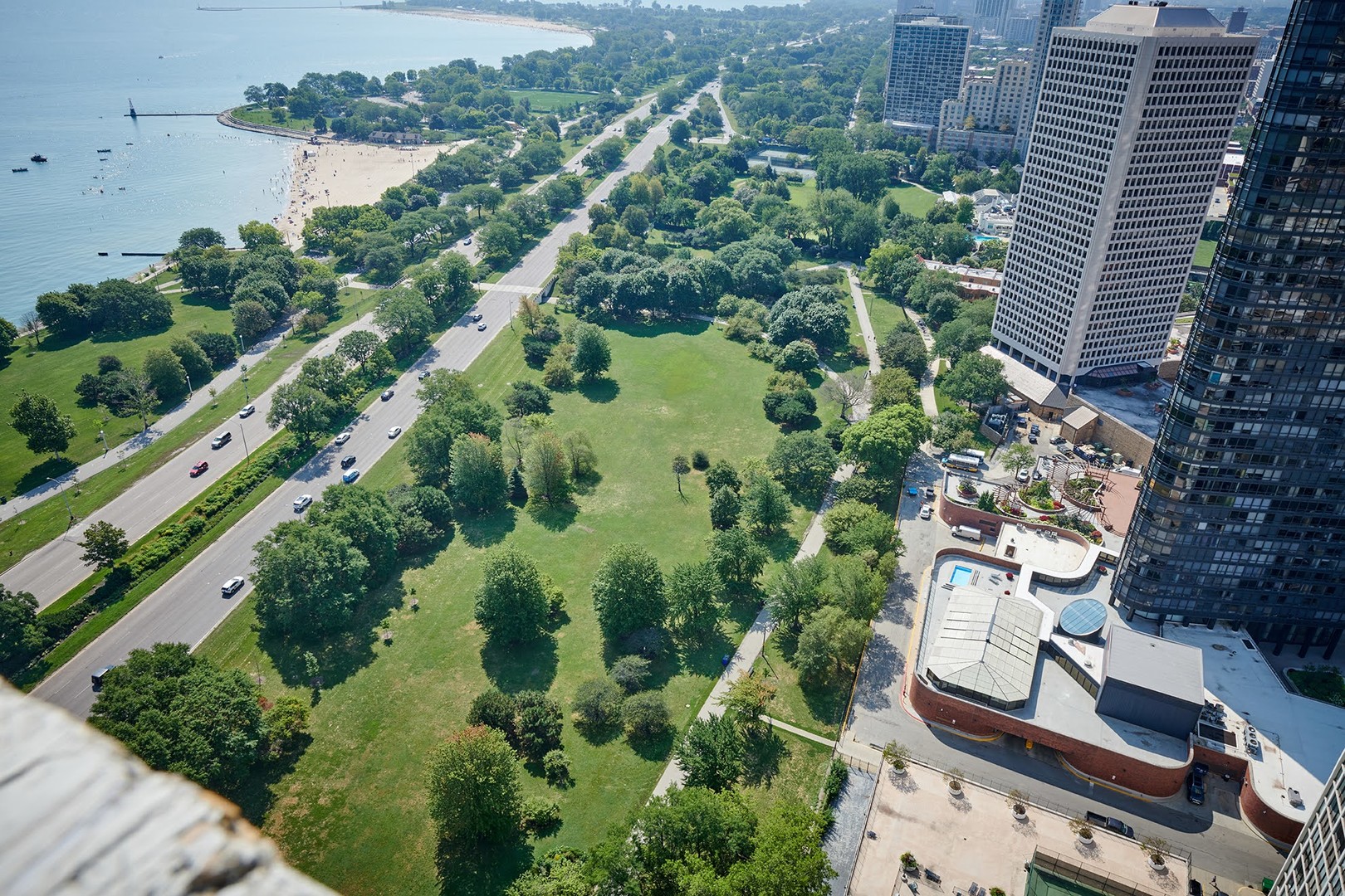 5455 North Sheridan Road, Unit 3811 Chicago, IL 60640 - Photo 31 of 35 an aerial view of multiple houses with yard