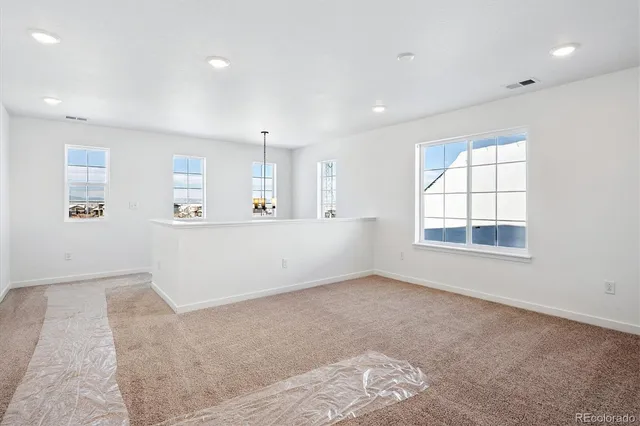a view of kitchen and windows