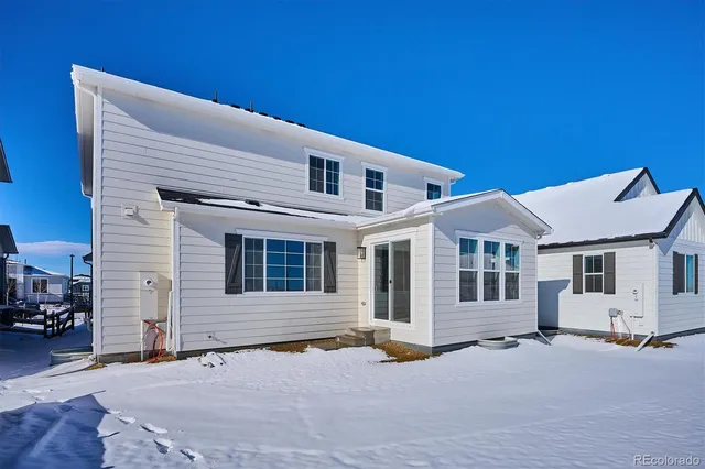 a backyard of a house with yard and garage