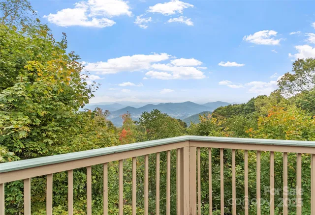 a view of a balcony with an outdoor space