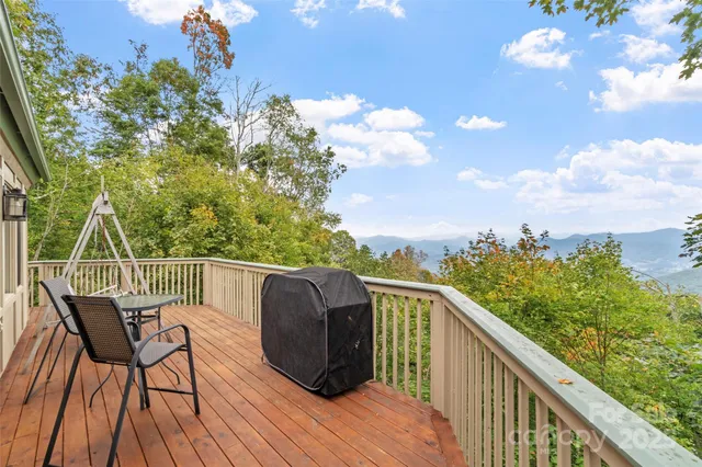 a view of balcony with furniture