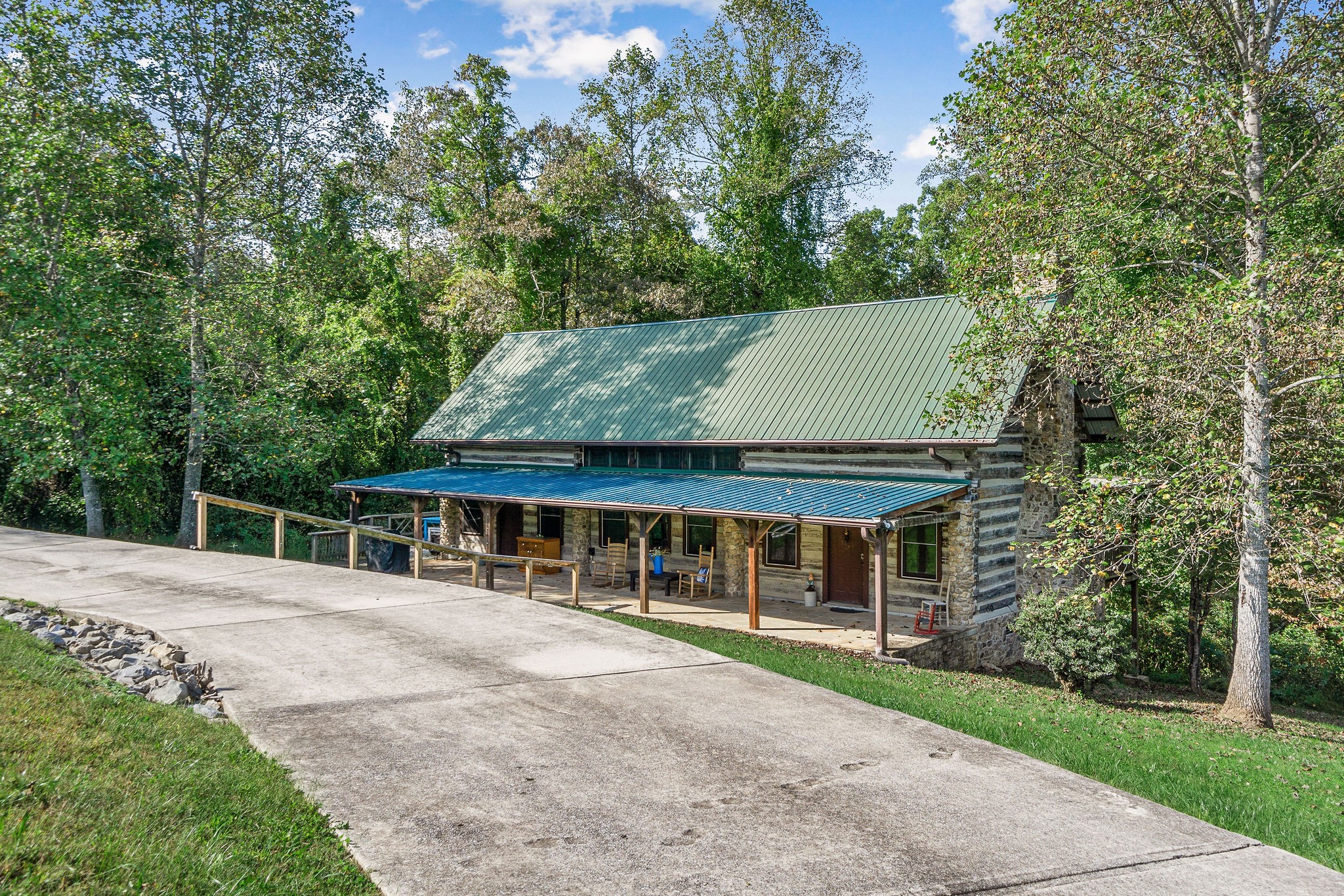 front view of a house with a garden