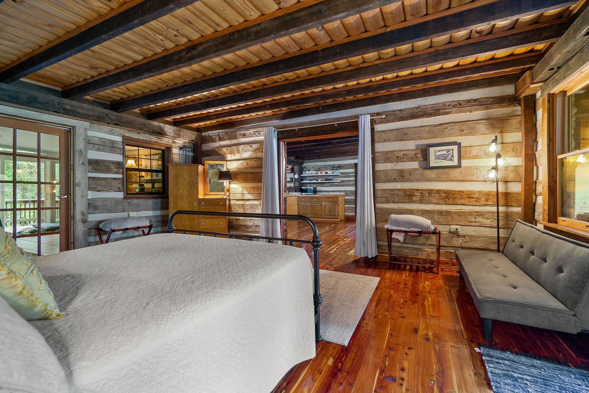 12159 Cookeville Boat Dock Road Baxter, TN 38544 - Photo 18 of 41 a bed room with a bed and a large window