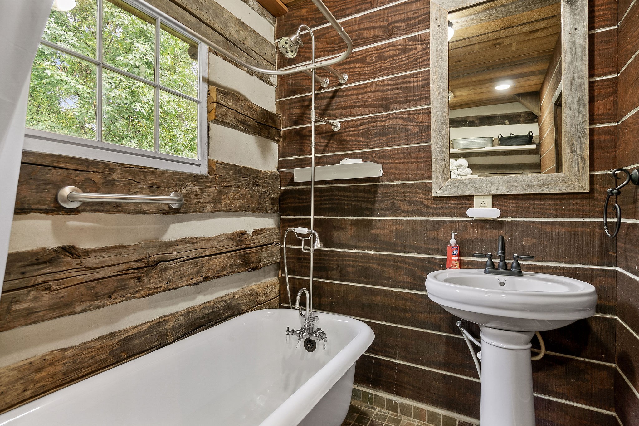 12159 Cookeville Boat Dock Road Baxter, TN 38544 - Photo 19 of 41 a bathroom with a sink and a bathtub