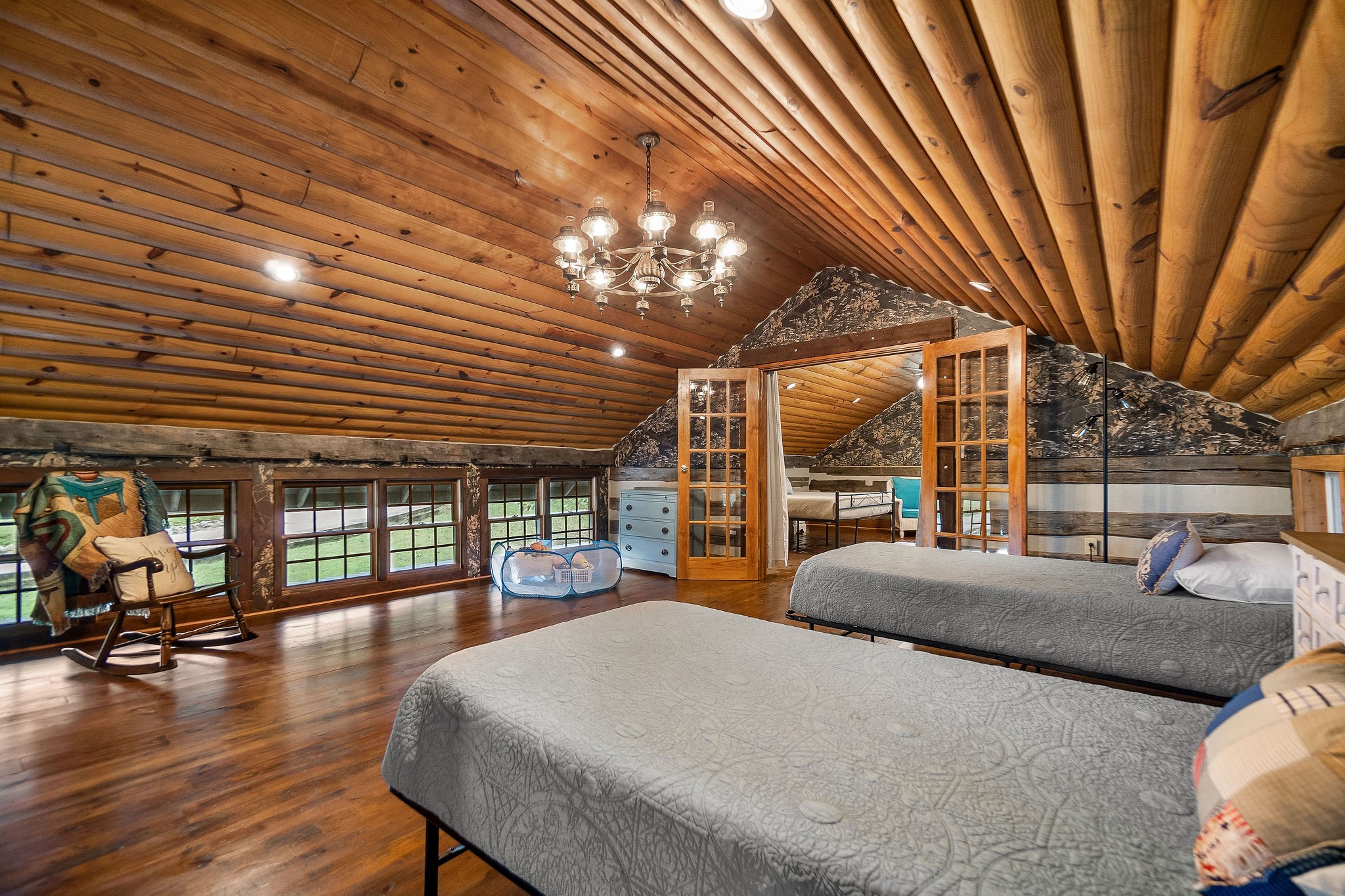 12159 Cookeville Boat Dock Road Baxter, TN 38544 - Photo 22 of 41 a bedroom with furniture and a large window