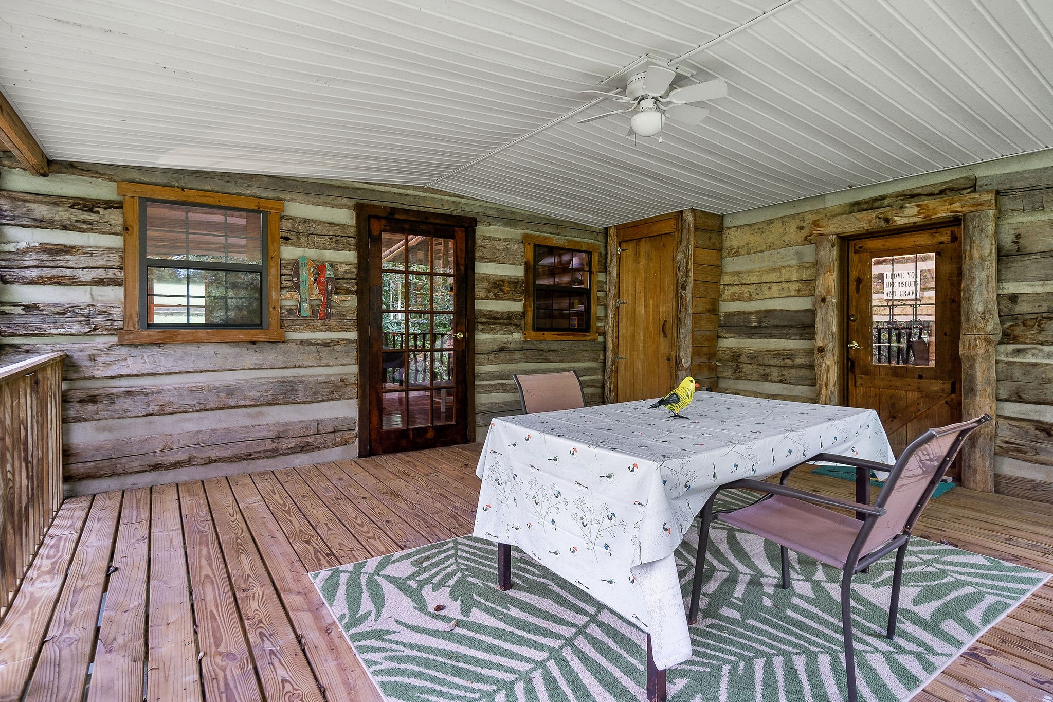 12159 Cookeville Boat Dock Road Baxter, TN 38544 - Photo 29 of 41 a bedroom with a bed and wooden floor