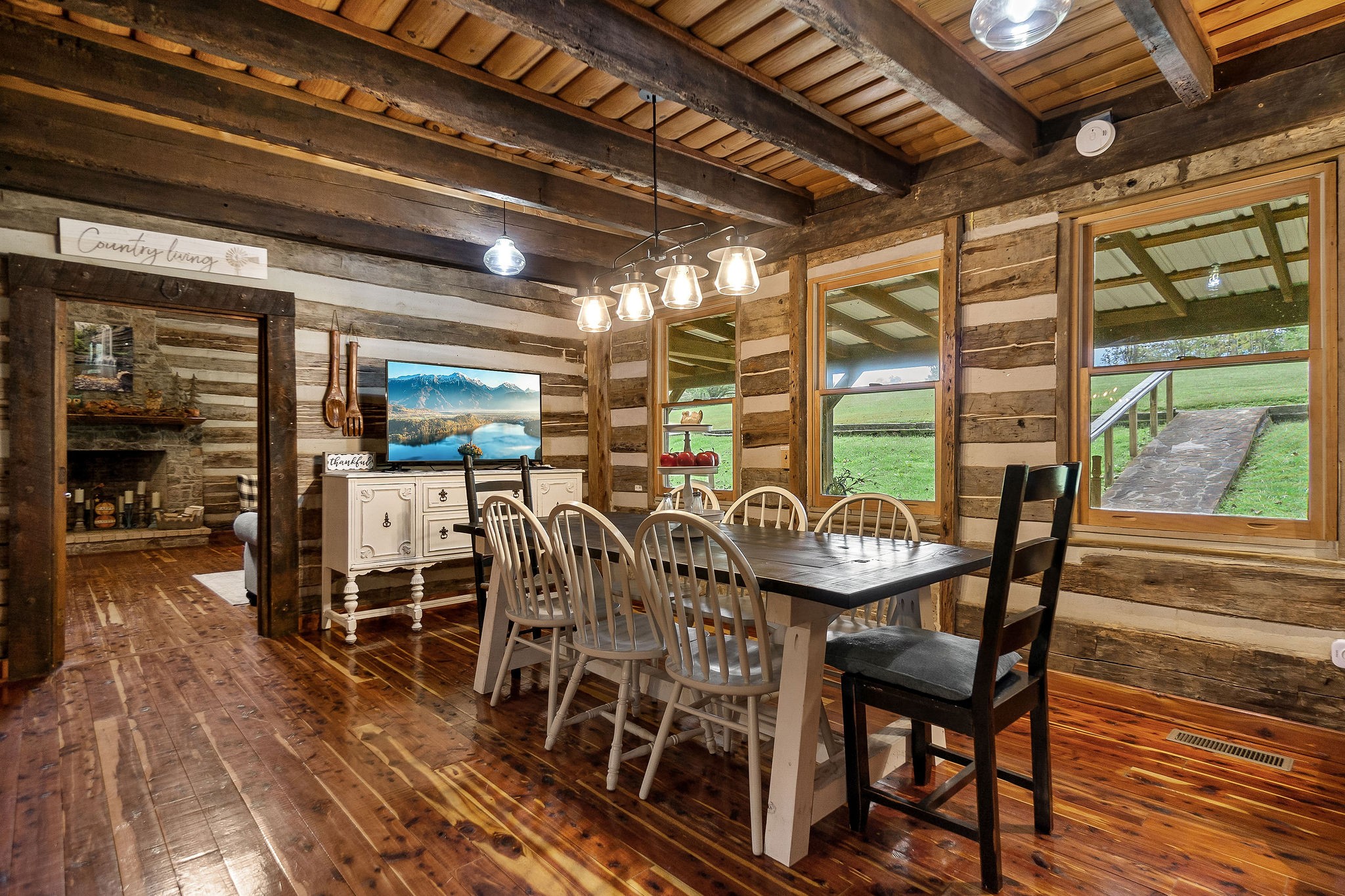 12159 Cookeville Boat Dock Road Baxter, TN 38544 - Photo 31 of 41 a view of a dining room with furniture window and outside view
