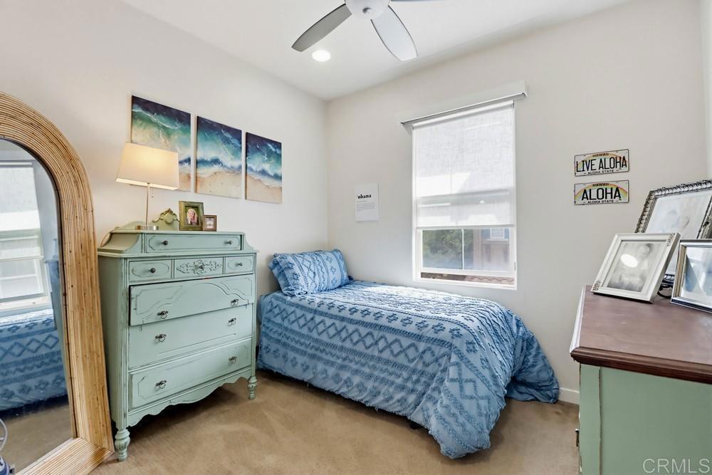 2182 Cosmo Way San Marcos, CA 92078 - Photo 26 of 34 a bedroom with a bed and with furniture