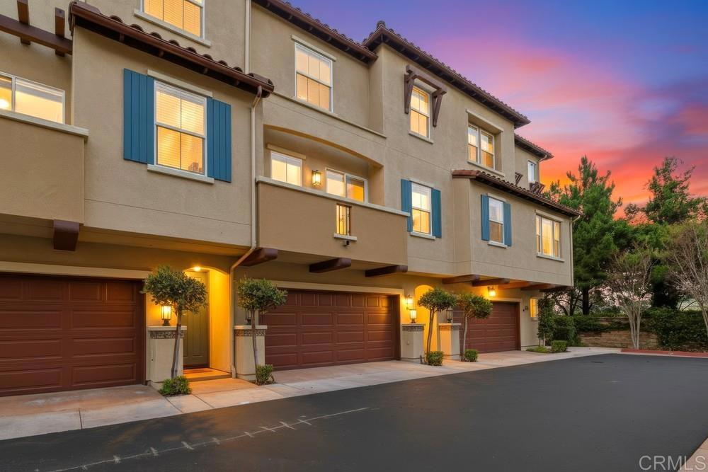 2182 Cosmo Way San Marcos, CA 92078 - Photo 33 of 34 a view of a building with a street