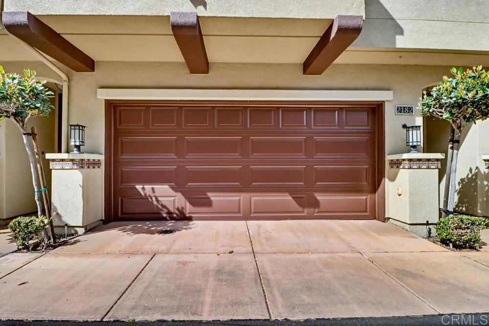 2182 Cosmo Way San Marcos, CA 92078 - Photo 34 of 34 a couple of potted plants in front of door