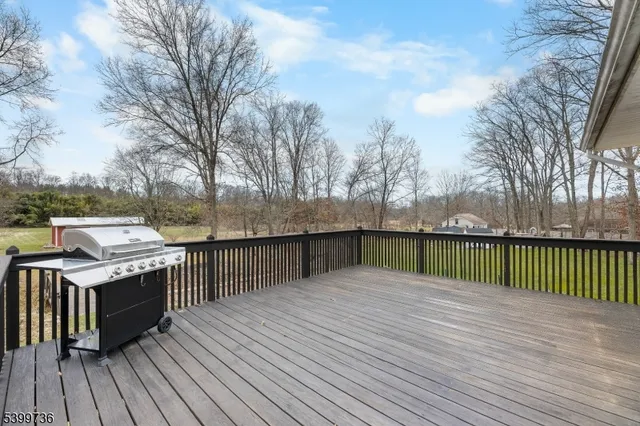 a view of balcony with wooden floor