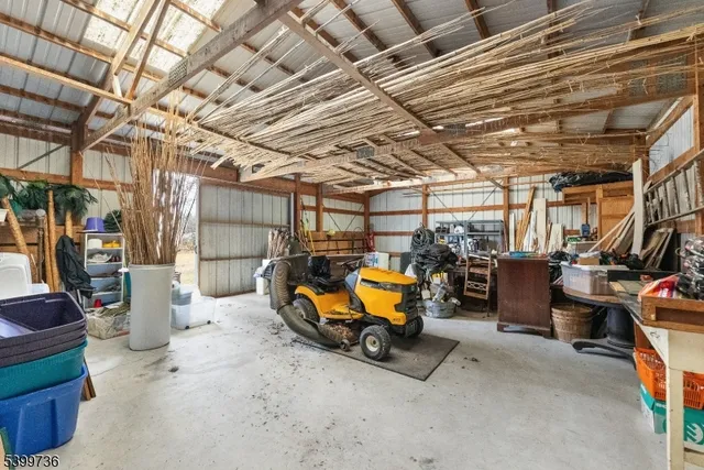 a view of a garage with a table and chairs