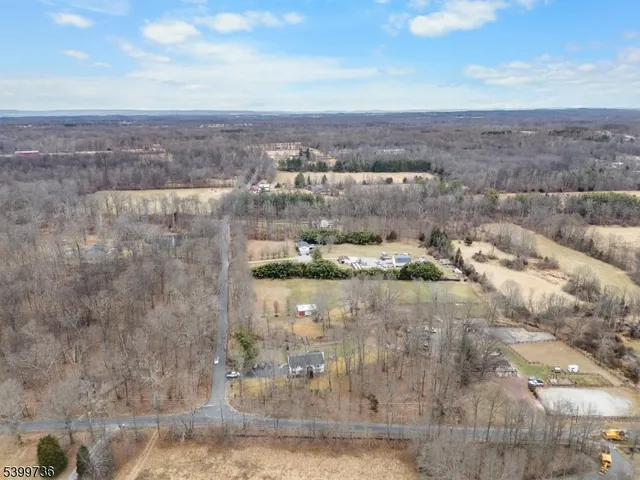 a view of a lake with a yard