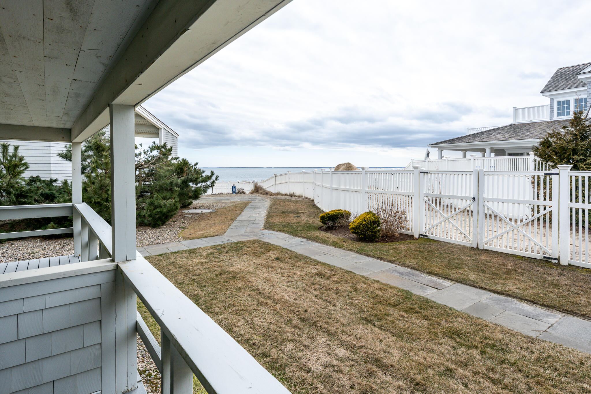 94 Shore Drive West, Unit 9B Mashpee, MA 02649 - Photo 25 of 35 a view of outdoor space and seating area