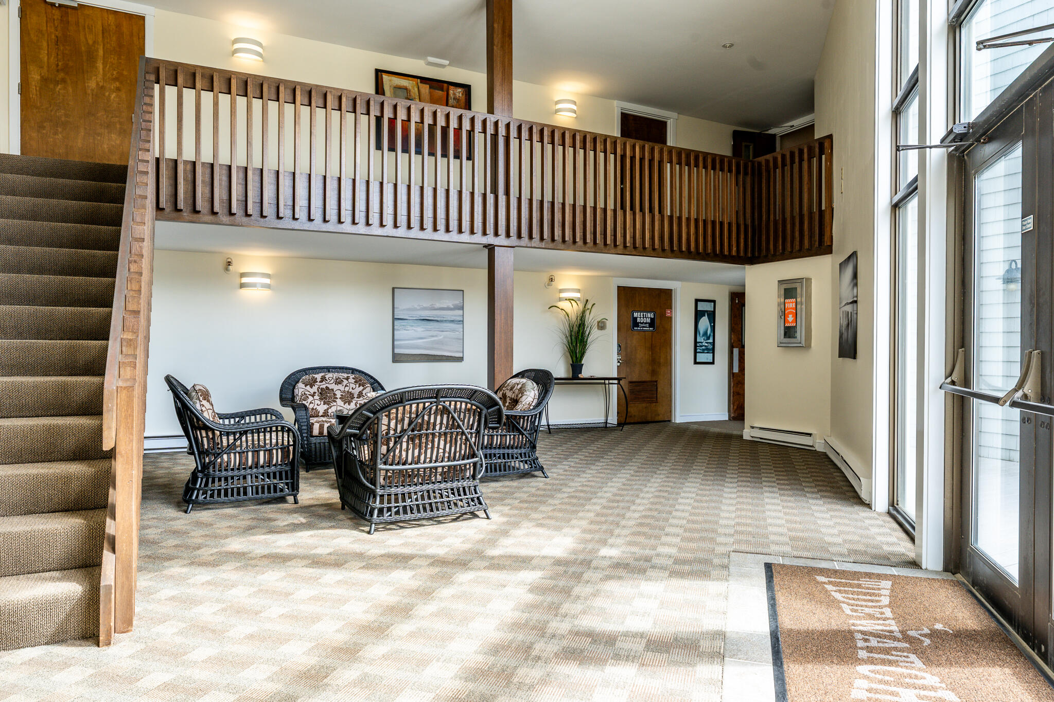 94 Shore Drive West, Unit 9B Mashpee, MA 02649 - Photo 31 of 35 a view of a hallway with seating space