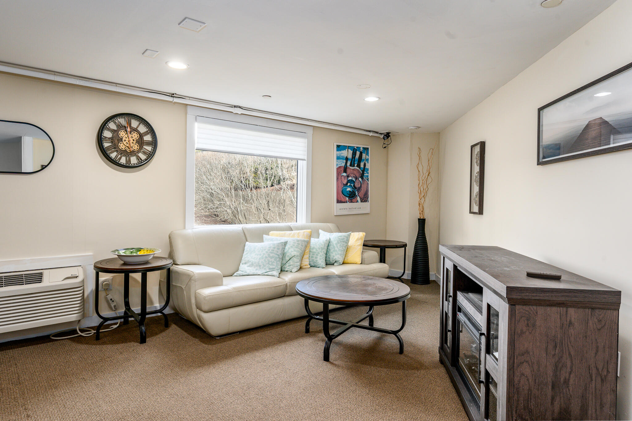 94 Shore Drive West, Unit 9B Mashpee, MA 02649 - Photo 32 of 35 a living room with furniture and a window