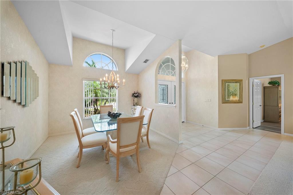 3971 Spring Garden Lane Estero, FL 33928 - Photo 18 of 31 a dining room with furniture and window