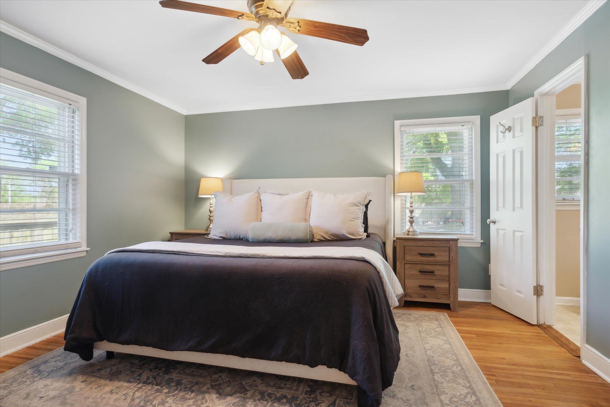 336 McElroy Road Memphis, TN 38120 - Photo 11 of 26 Bedroom featuring ceiling fan, light wood-type flooring, and crown molding