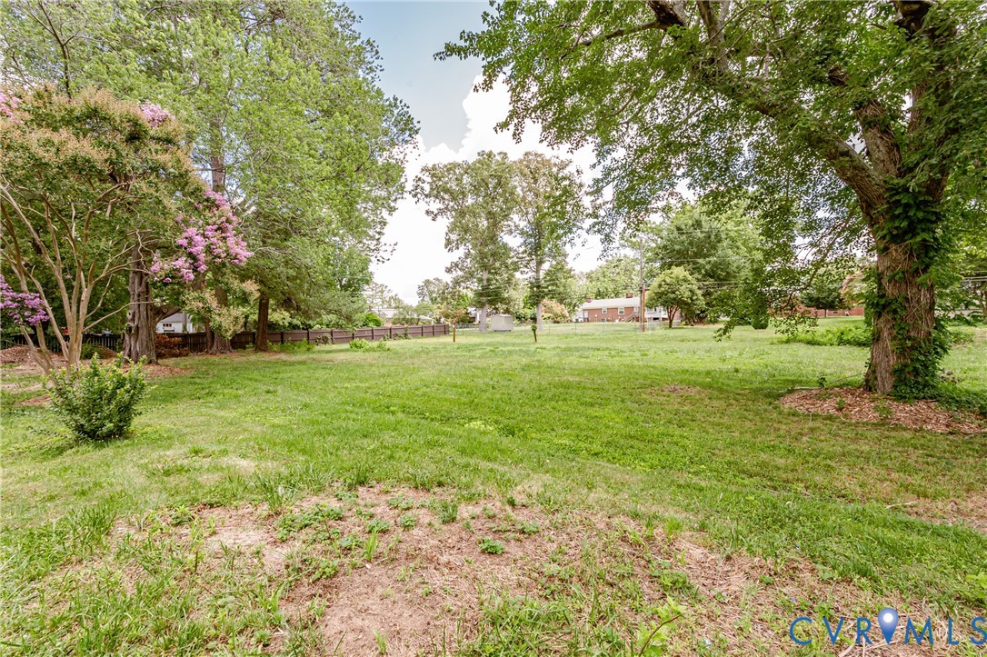 2015 Fordson Road Richmond, VA 23229 - Photo 45 of 48 Expansive green lawn with mature trees and a woode