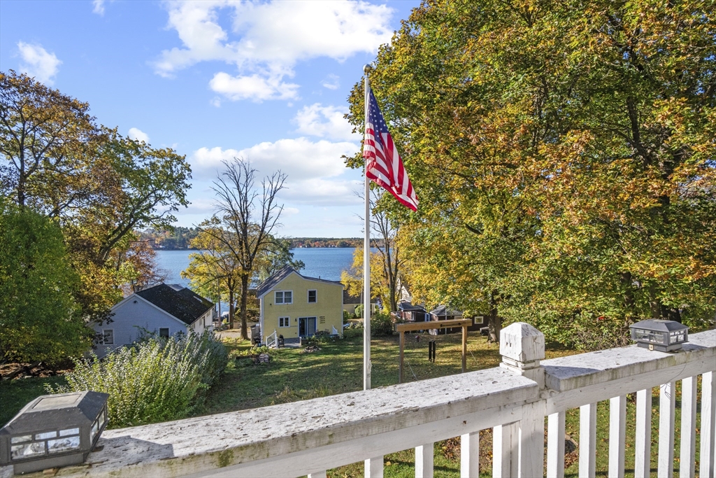 8 Mockingbird Hill Road Amesbury, MA 01913 - Photo 11 of 35 a view of a house with a yard