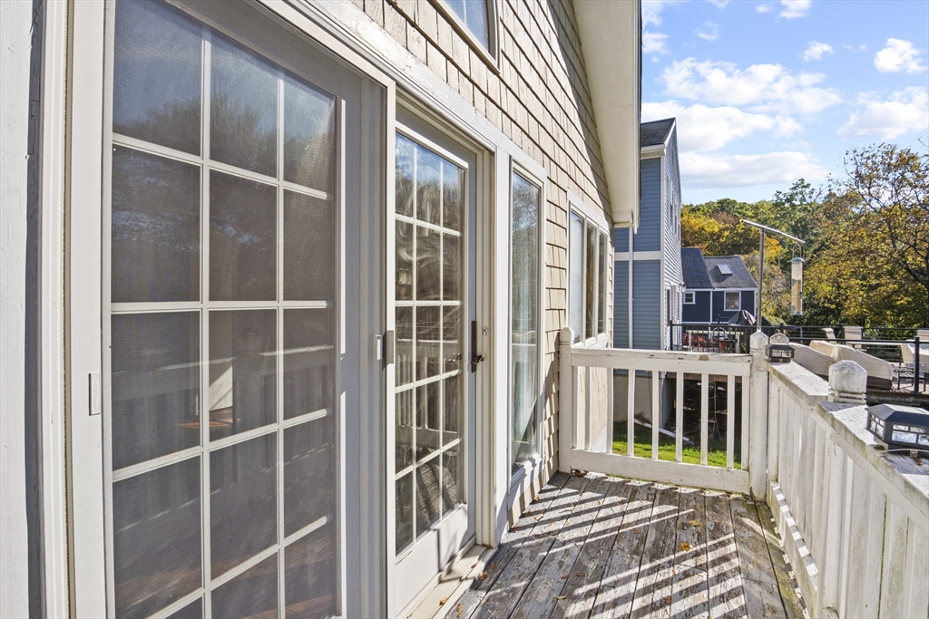 8 Mockingbird Hill Road Amesbury, MA 01913 - Photo 14 of 35 a view of a house with a window