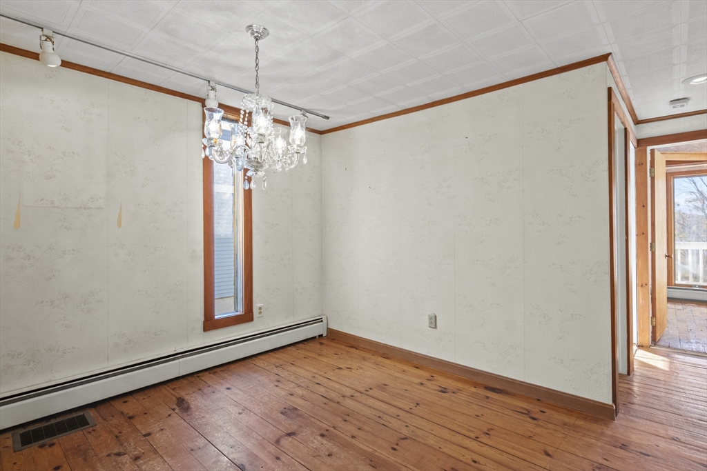 8 Mockingbird Hill Road Amesbury, MA 01913 - Photo 17 of 35 a view of a room with wooden floor and window