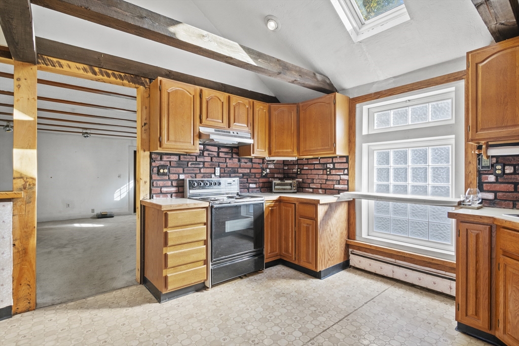8 Mockingbird Hill Road Amesbury, MA 01913 - Photo 20 of 35 a view of kitchen with furniture and large window