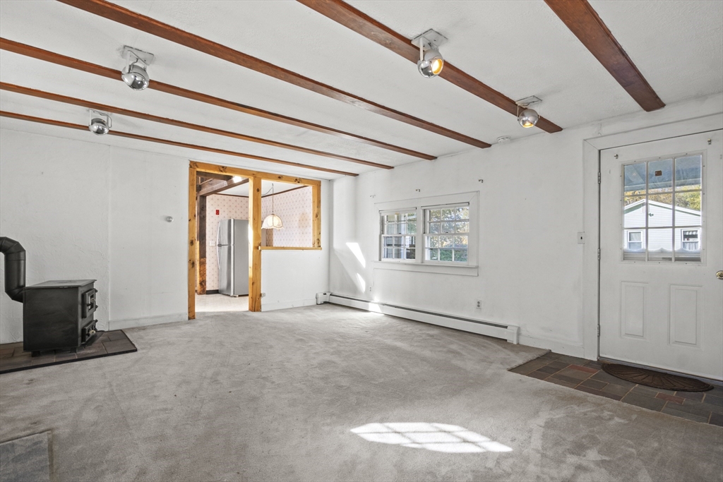 8 Mockingbird Hill Road Amesbury, MA 01913 - Photo 26 of 35 a view of an empty room with a window