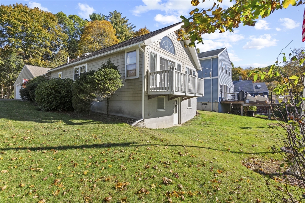 8 Mockingbird Hill Road Amesbury, MA 01913 - Photo 30 of 35 a view of a house with a yard