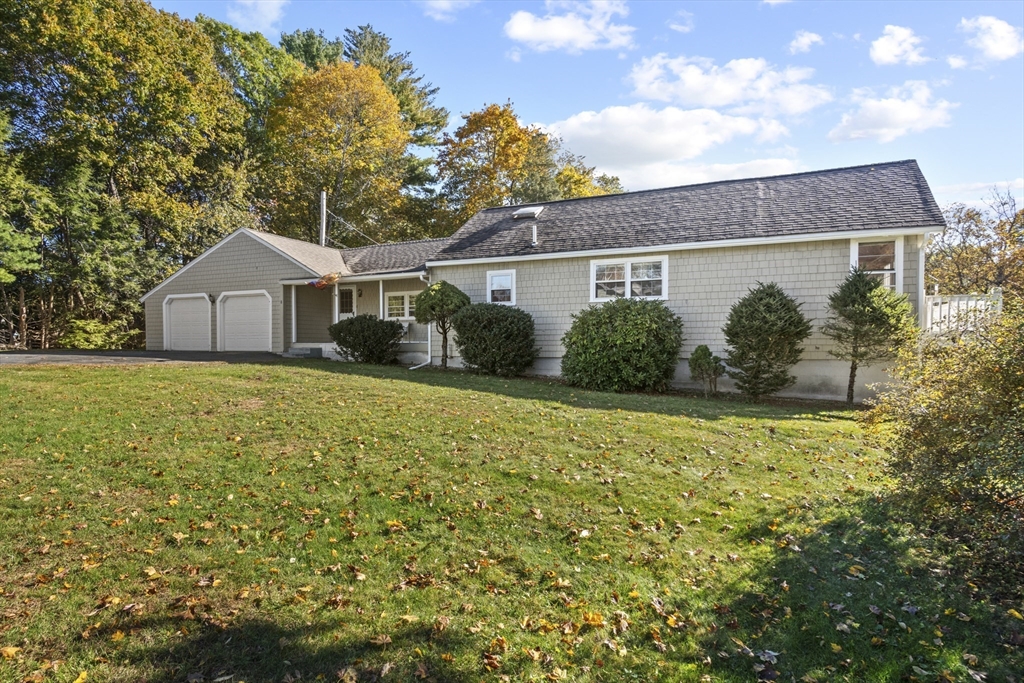 8 Mockingbird Hill Road Amesbury, MA 01913 - Photo 3 of 35 front view of a house with yard