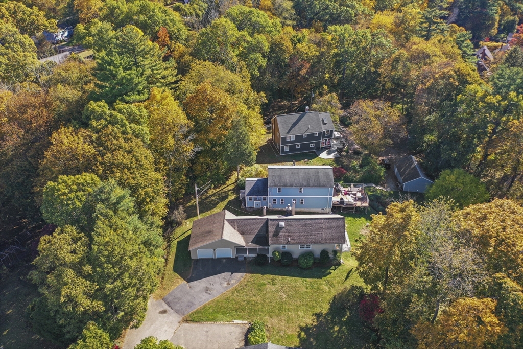 8 Mockingbird Hill Road Amesbury, MA 01913 - Photo 33 of 35 a view of a house with a yard
