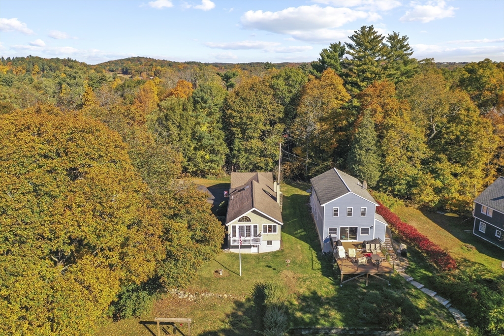 8 Mockingbird Hill Road Amesbury, MA 01913 - Photo 4 of 35 a aerial view of a house with a yard