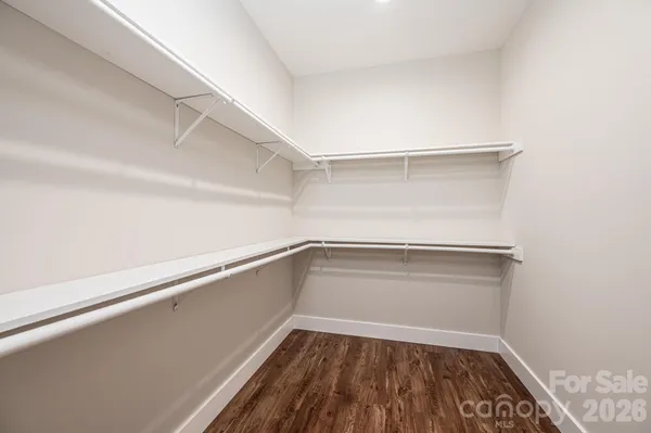 a view of an empty walk in closet