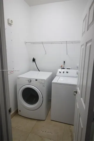 a view of road with a building in the background