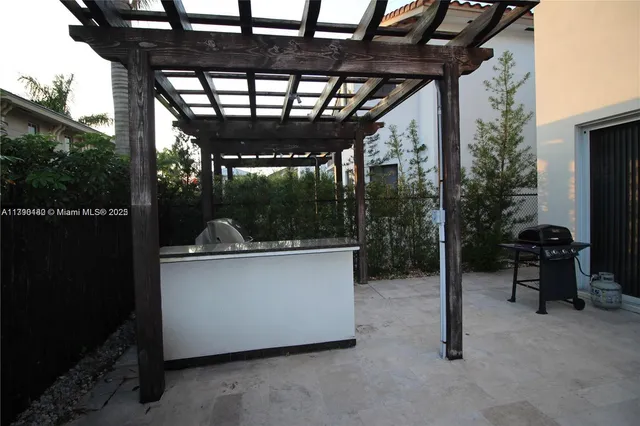 a view of living room with a sink and swing