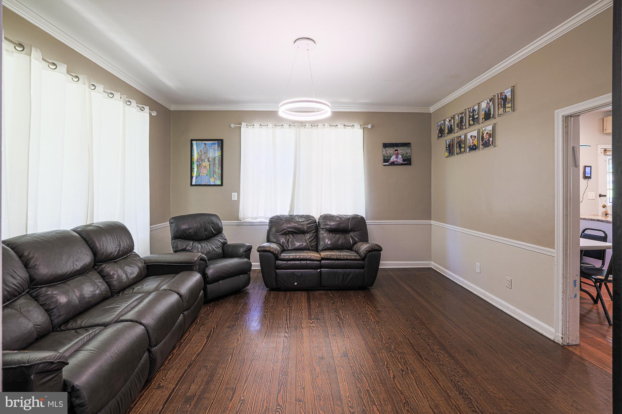 3305 Bancroft Road Baltimore, MD 21215 - Photo 26 of 61 Inviting space with warm wooden floors.