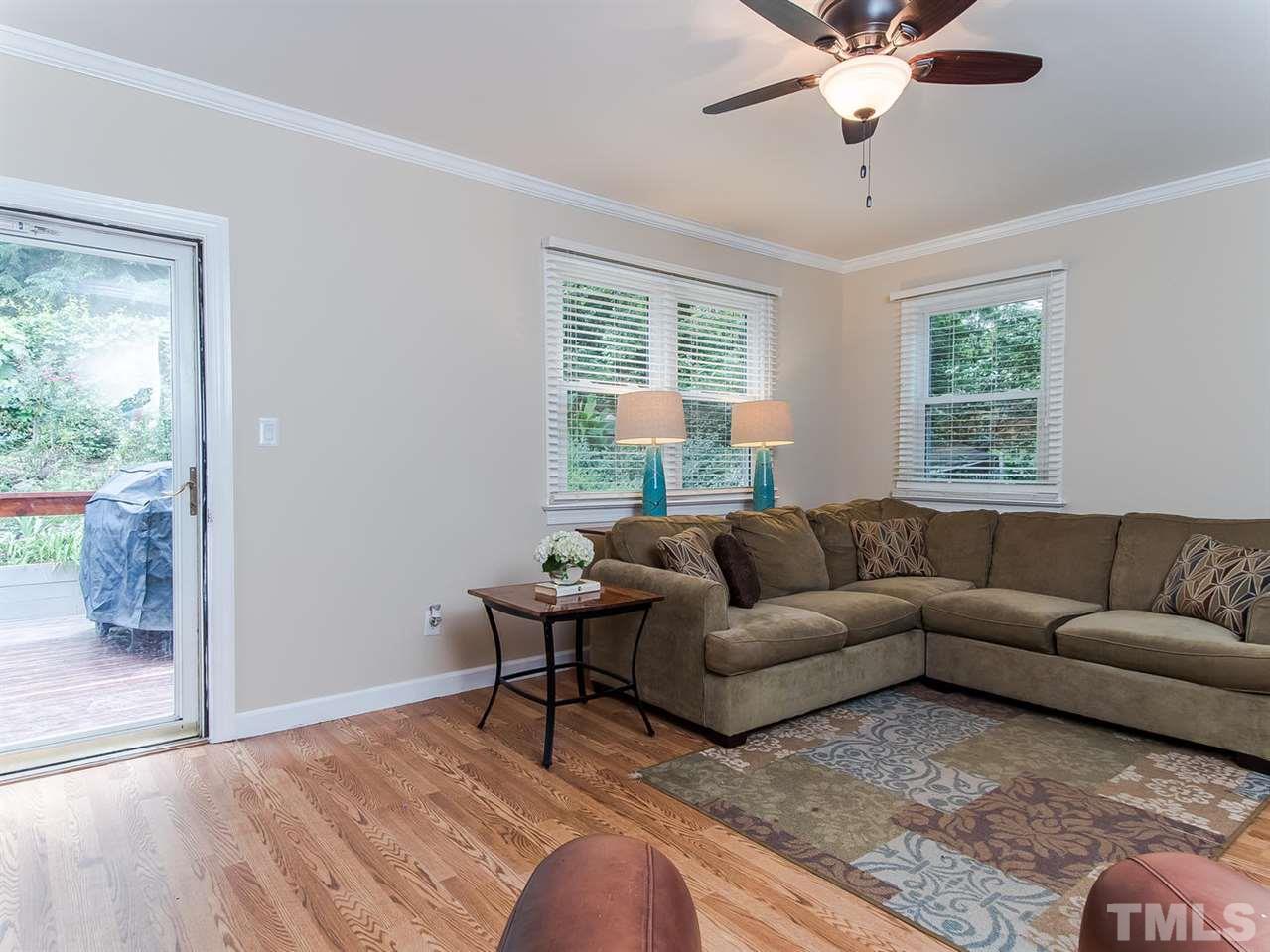 5105 Carter Street Raleigh, NC 27612 - Photo 14 of 25 a living room with furniture and a window