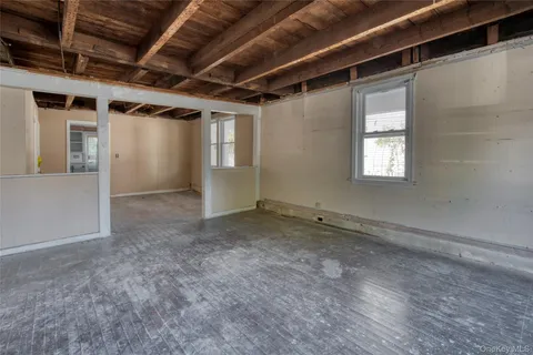 a view of a room with wooden walls