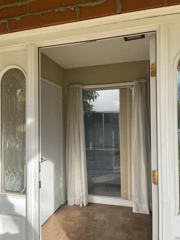 a view of a entryway door of the house