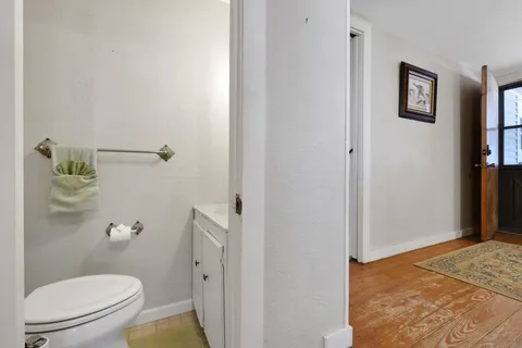 a spacious bedroom with a bed and window