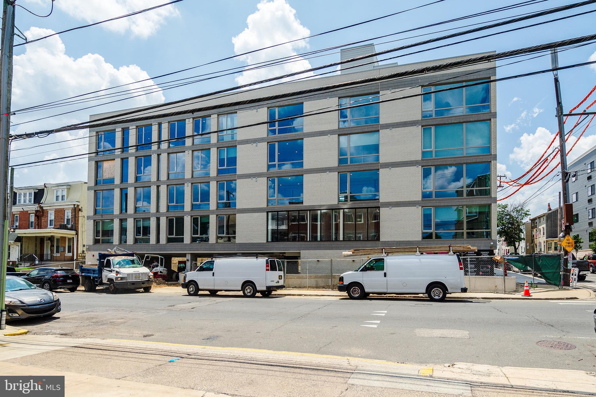 6604 Ridge Avenue, Unit 311 Philadelphia, PA 19128 - Photo 28 of 32 a car parked in front of a building