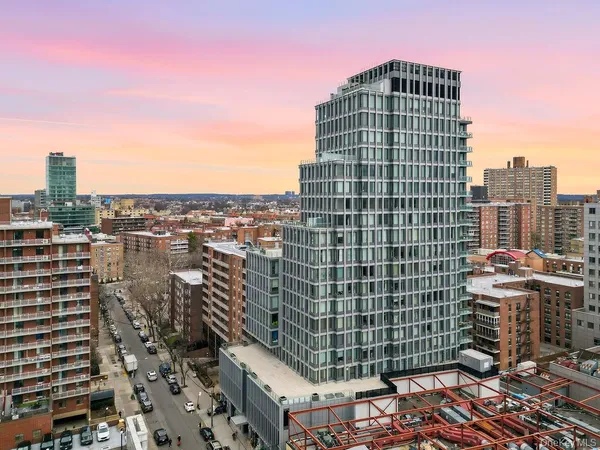 a view of a city with tall buildings