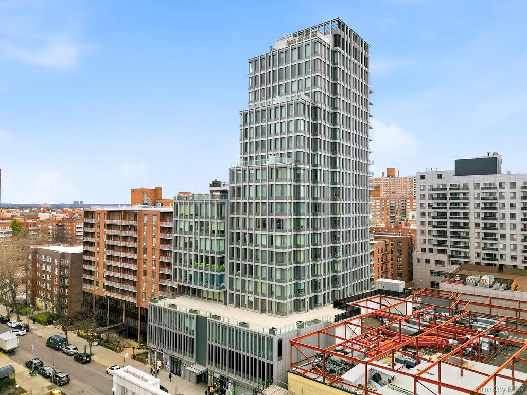 136-18 Maple Avenue, Unit 9A Queens, NY 11355 - Photo 35 of 35 View of building exterior featuring a city view