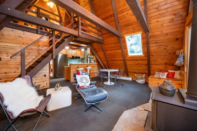 a table room with furniture and a window