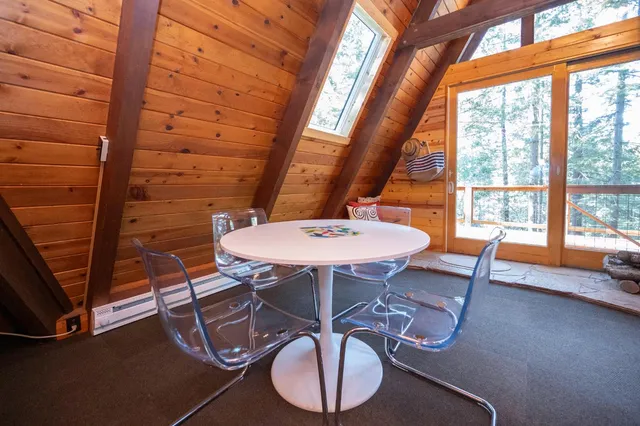 a view of an outdoor dining space with seating area